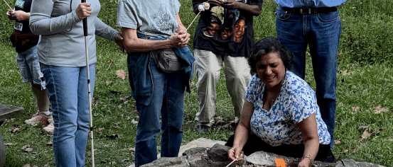 people around a campfire